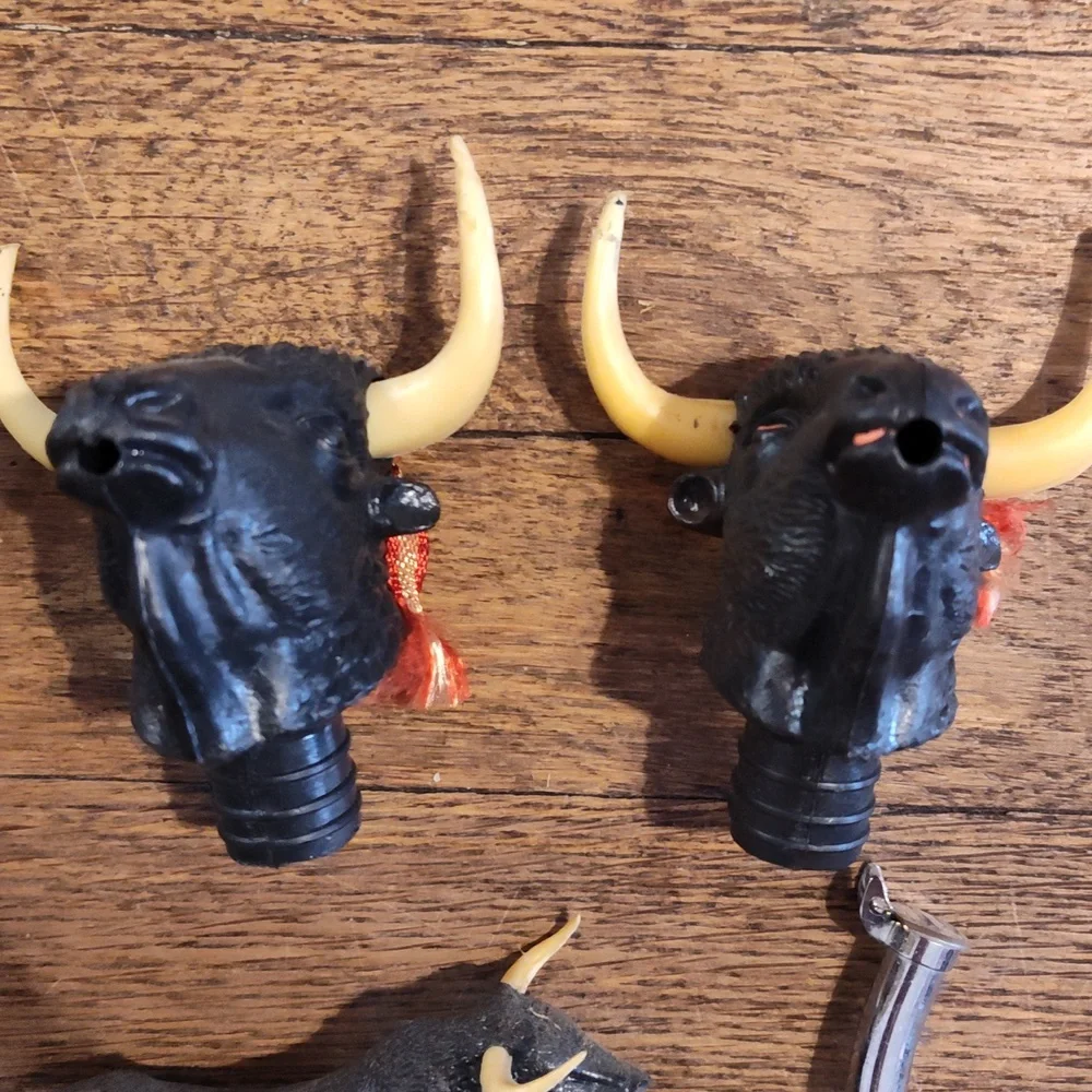 Lot Of vintage plastic bull head bottle pourer and stopper